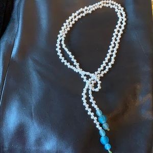 Unusual hand strung pearl necklace with frosted glass beads